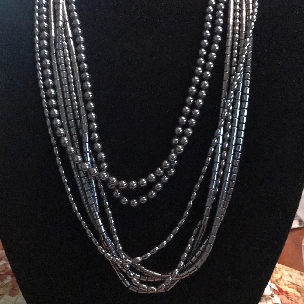 Bundle of black metal necklaces